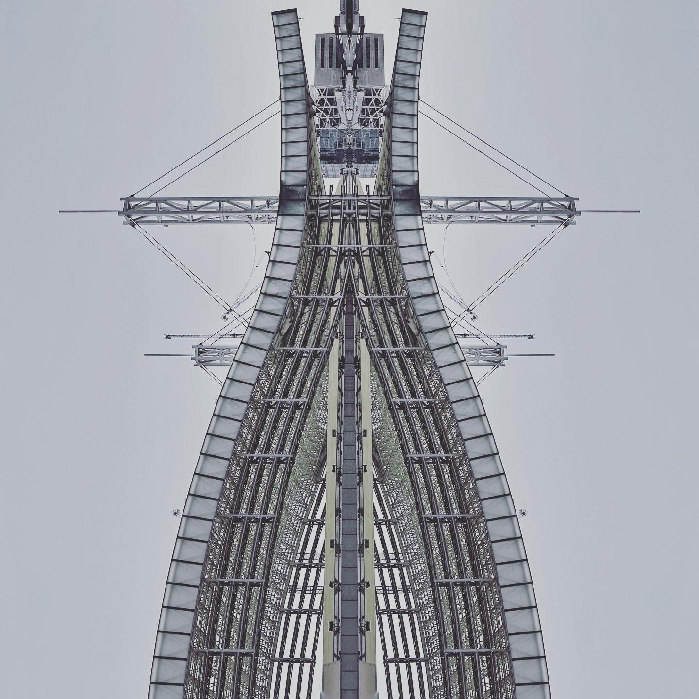 Symmetrical steel-glass tower structure