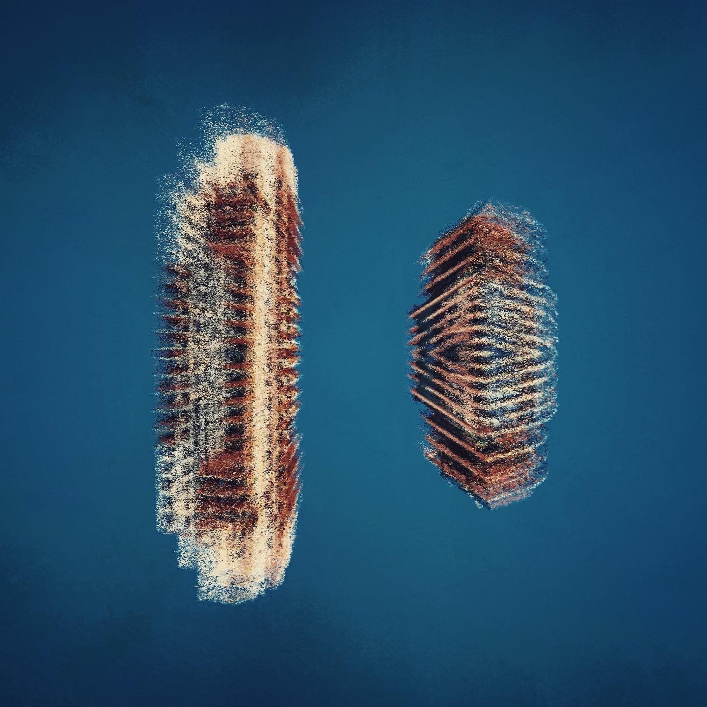 Two abstract layered architectural forms