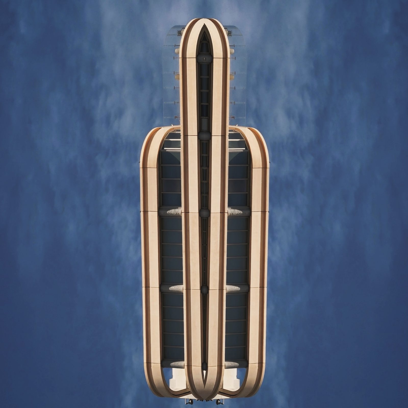 Futuristic architectural tower with curved sections